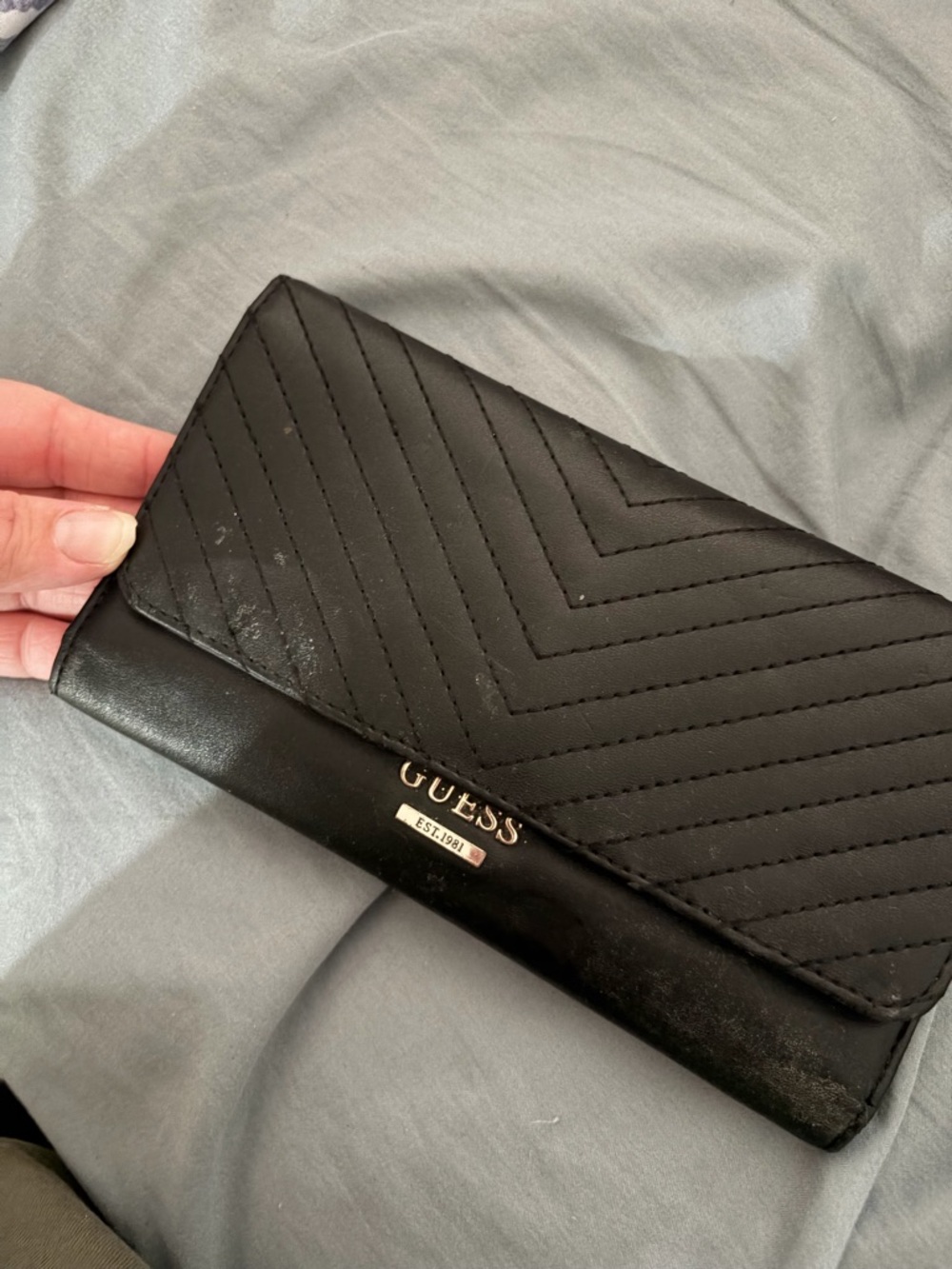 GUESS Black Quilted Foldover Clutch with Gold Logo Plate